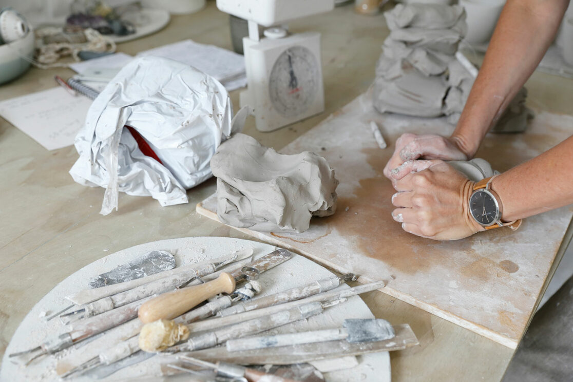 ceramicist kneading clay