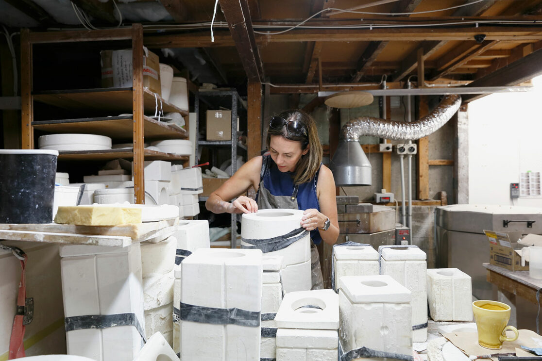 Renee Boyd inspecting moulds